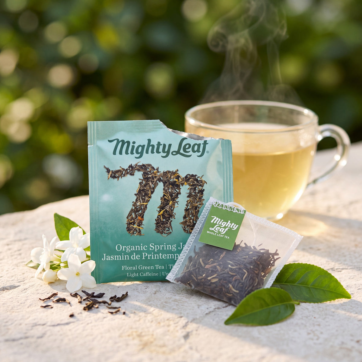 Mighty Leaf Organic Spring Jasmine hand-stitched silk tea pouch on its foil sachet, best before Dec 9, 2026
