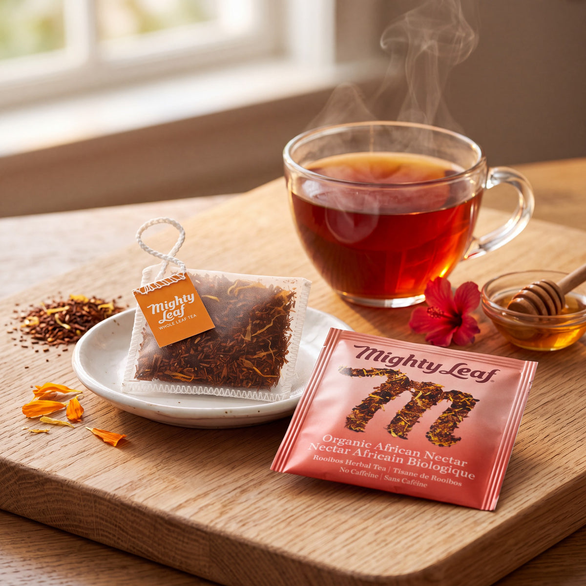 Mighty Leaf Organic African Nectar hand-stitched silk tea pouch on its foil sachet, best before Mar 26, 2027